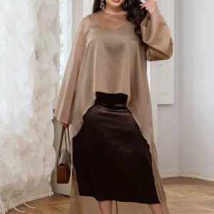 Asymmetrical cape made of lightweight fabric